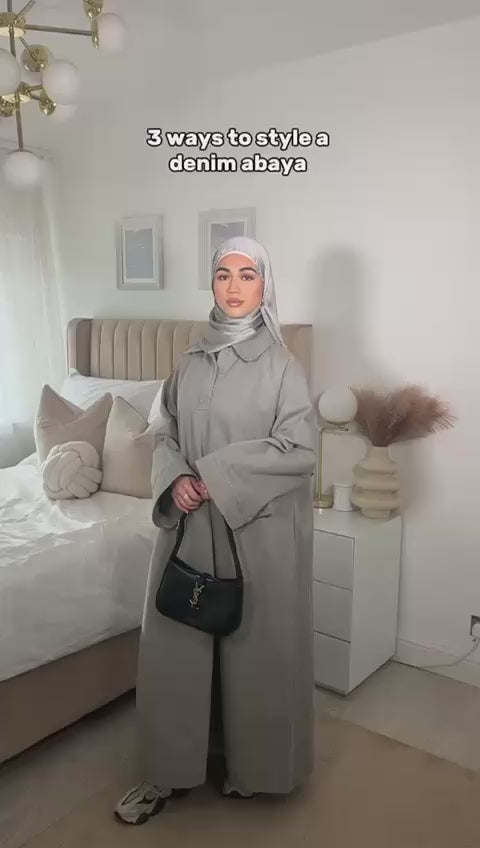 Woman wearing denim abaya